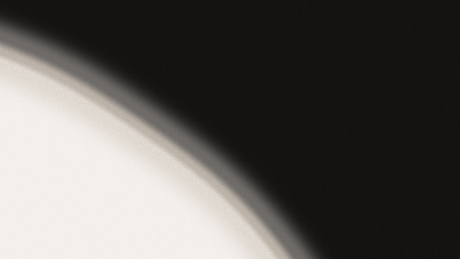 Brand artwork: a pale fluid edge curving out of black